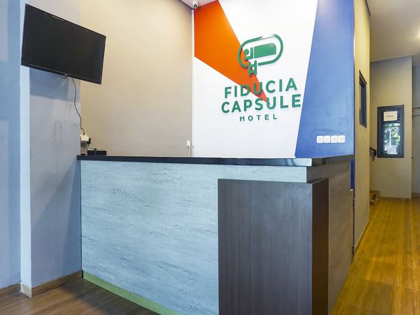 Imagen de los interiores del Hotel Super OYO 91328 Fiducia Capsule. Foto 19