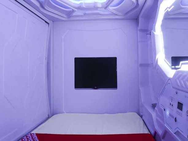 Imagen de la habitación del Hotel Super OYO 91328 Fiducia Capsule. Foto 11