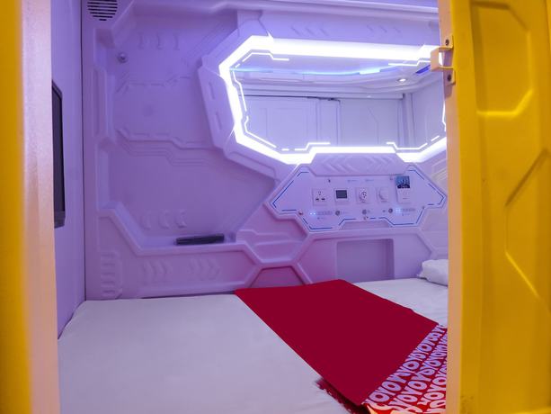 Imagen de la habitación del Hotel Super OYO 91328 Fiducia Capsule. Foto 14