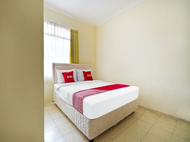 Imagen de la habitación del Hotel Super OYO 91350 Garden Hostel. Foto 18