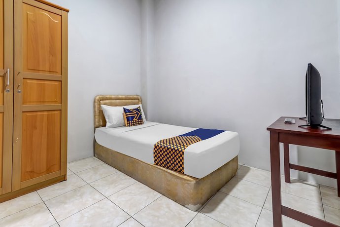 Imagen de la habitación del Hotel Super OYO 91366 The Chatter Place. Foto 4