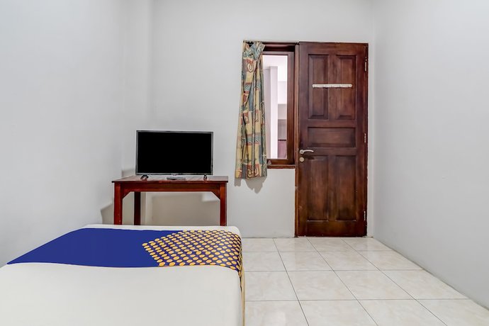 Imagen de la habitación del Hotel Super OYO 91366 The Chatter Place. Foto 6