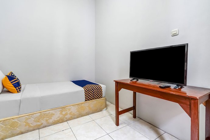 Imagen de la habitación del Hotel Super OYO 91366 The Chatter Place. Foto 11