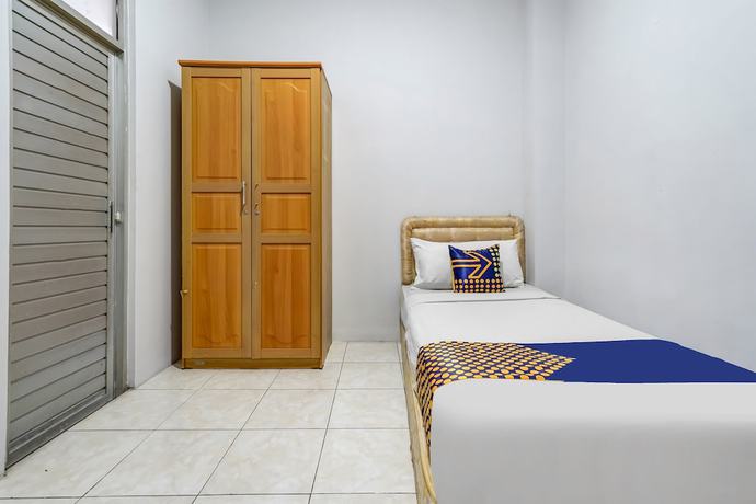 Imagen de la habitación del Hotel Super OYO 91366 The Chatter Place. Foto 14