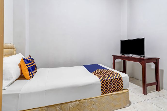 Imagen de la habitación del Hotel Super OYO 91366 The Chatter Place. Foto 16