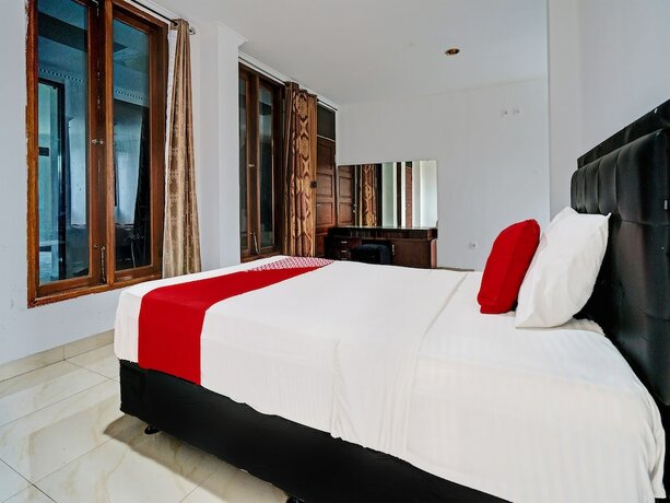 Imagen de la habitación del Hotel Super OYO 92252 Wisma Rina Rini Cibiru Managed By Hss Group. Foto 17