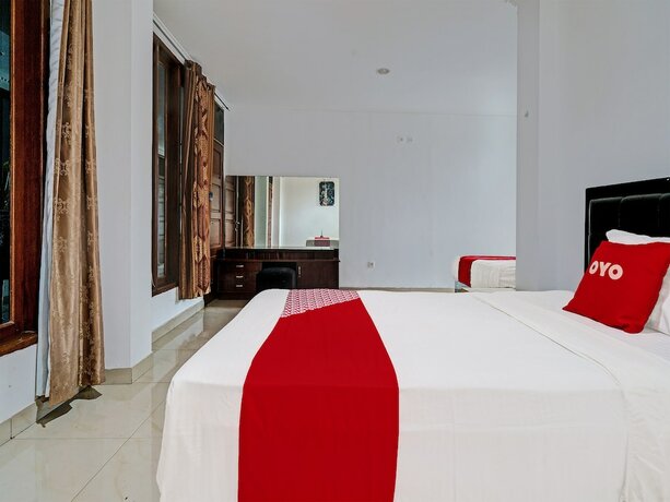 Imagen de la habitación del Hotel Super OYO 92252 Wisma Rina Rini Cibiru Managed By Hss Group. Foto 18
