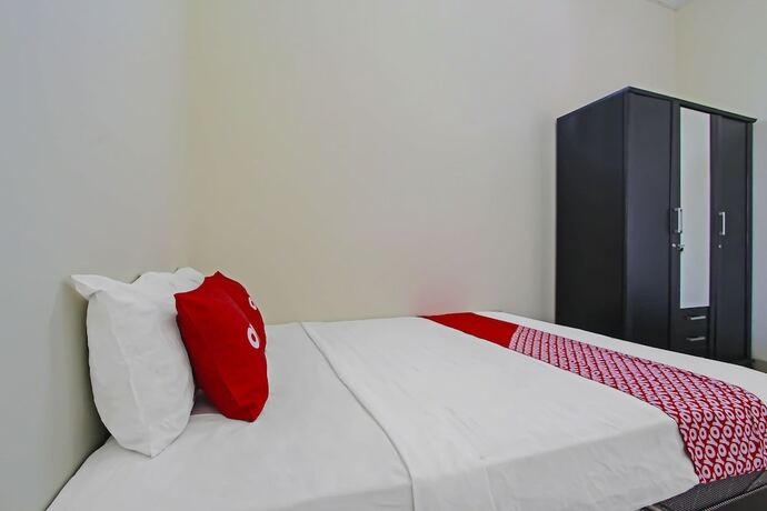Imagen de la habitación del Hotel Super OYO 92437 Wahidin Guesthouse. Foto 13