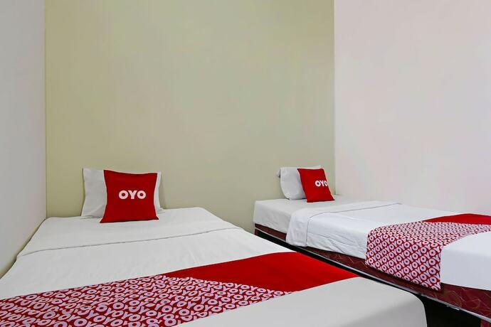Imagen de la habitación del Hotel Super OYO 92437 Wahidin Guesthouse. Foto 14