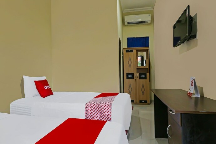 Imagen de la habitación del Hotel Super OYO 92437 Wahidin Guesthouse. Foto 16