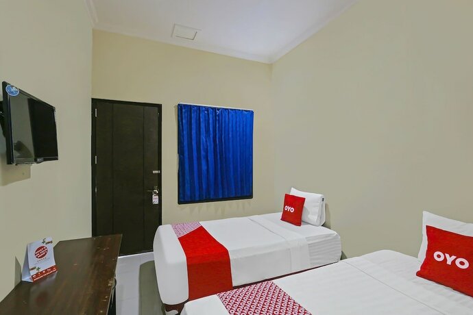 Imagen de la habitación del Hotel Super OYO 92437 Wahidin Guesthouse. Foto 20