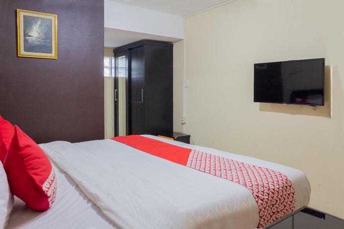 Imagen de la habitación del Hotel Super OYO 989 Audah Guesthouse Syariah. Foto 2