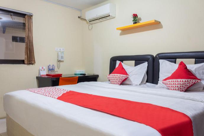 Imagen de la habitación del Hotel Super OYO 989 Audah Guesthouse Syariah. Foto 4