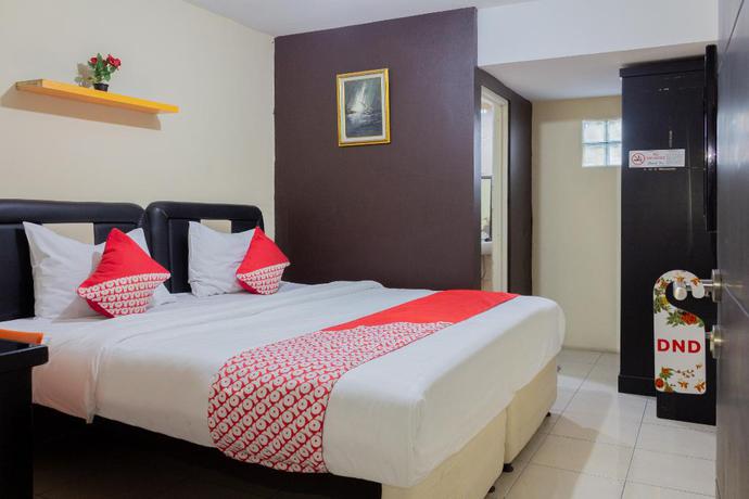 Imagen de la habitación del Hotel Super OYO 989 Audah Guesthouse Syariah. Foto 5