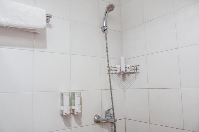 Imagen de la habitación del Hotel Super OYO 989 Audah Guesthouse Syariah. Foto 8