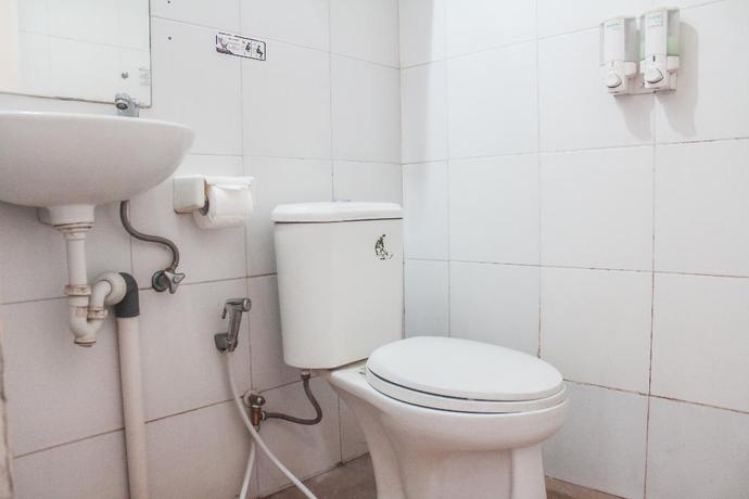 Imagen de la habitación del Hotel Super OYO 989 Audah Guesthouse Syariah. Foto 9