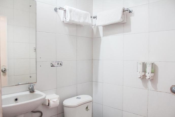 Imagen de la habitación del Hotel Super OYO 989 Audah Guesthouse Syariah. Foto 12