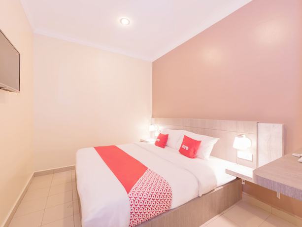 Imagen de la habitación del Hotel Super OYO Capital O 89366 Spring Inn Hotel. Foto 3
