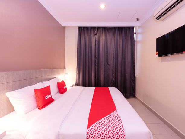 Imagen de la habitación del Hotel Super OYO Capital O 89366 Spring Inn Hotel. Foto 4