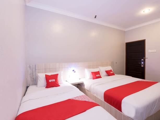 Imagen de la habitación del Hotel Super OYO Capital O 89366 Spring Inn Hotel. Foto 5