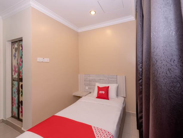 Imagen de la habitación del Hotel Super OYO Capital O 89366 Spring Inn Hotel. Foto 6