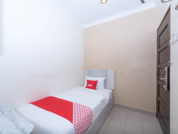 Imagen de la habitación del Hotel Super OYO Capital O 89366 Spring Inn Hotel. Foto 7