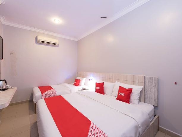Imagen de la habitación del Hotel Super OYO Capital O 89366 Spring Inn Hotel. Foto 8