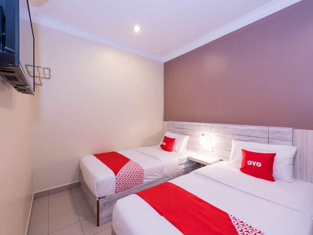 Imagen de la habitación del Hotel Super OYO Capital O 89366 Spring Inn Hotel. Foto 9