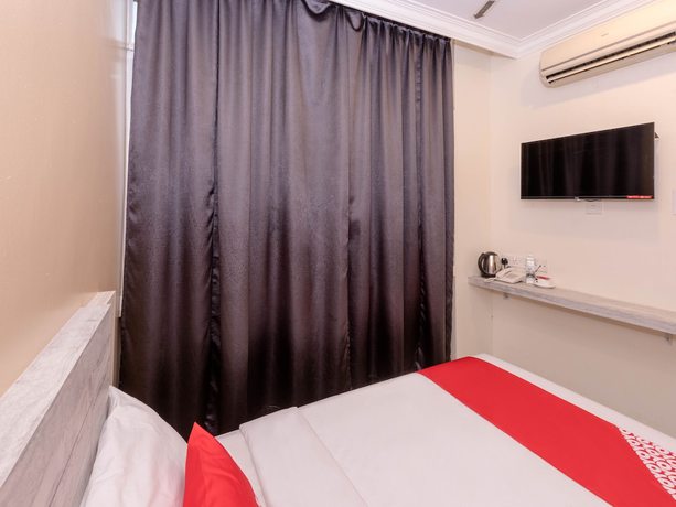 Imagen de la habitación del Hotel Super OYO Capital O 89366 Spring Inn Hotel. Foto 10