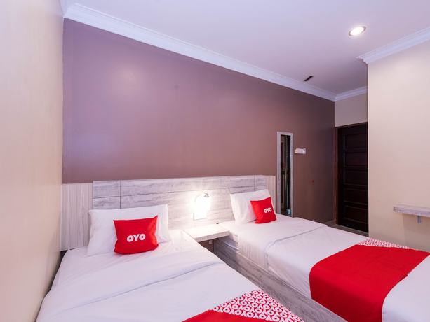 Imagen de la habitación del Hotel Super OYO Capital O 89366 Spring Inn Hotel. Foto 11