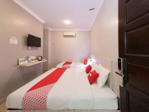 Imagen de la habitación del Hotel Super OYO Capital O 89366 Spring Inn Hotel. Foto 13