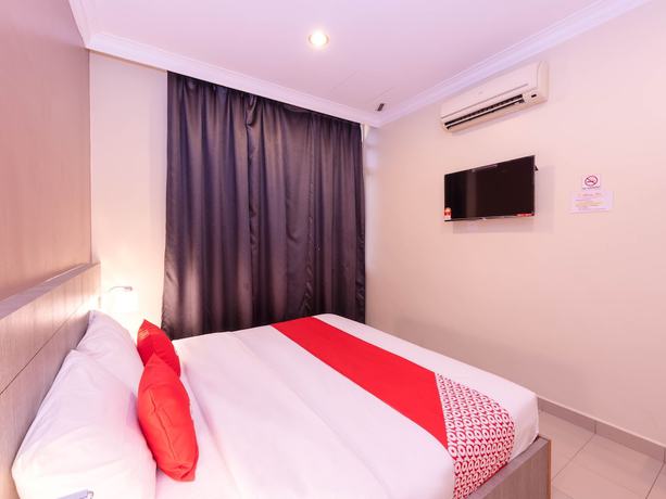 Imagen de la habitación del Hotel Super OYO Capital O 89366 Spring Inn Hotel. Foto 14