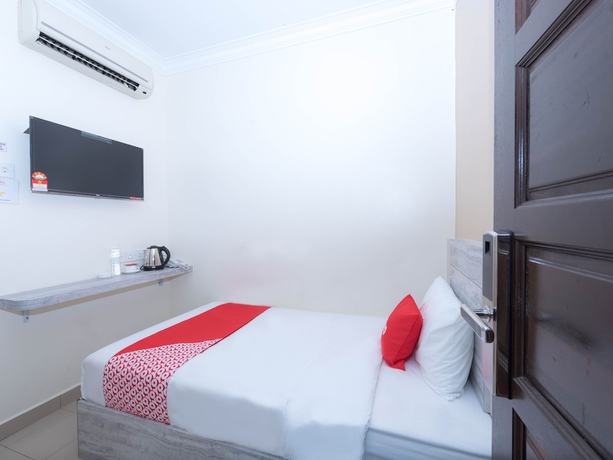 Imagen de la habitación del Hotel Super OYO Capital O 89366 Spring Inn Hotel. Foto 15