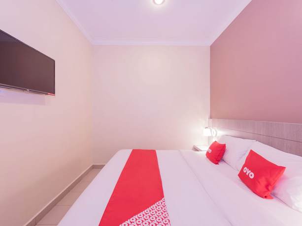 Imagen de la habitación del Hotel Super OYO Capital O 89366 Spring Inn Hotel. Foto 16