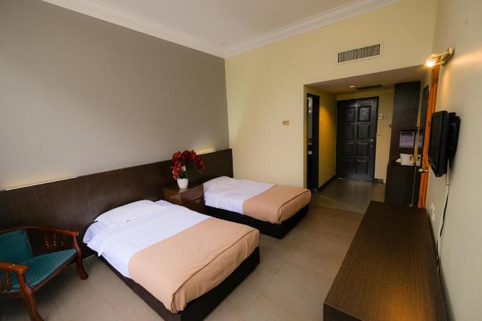 Imagen de la habitación del Hotel Super OYO Capital O 90146 Alh Continental Resort. Foto 3