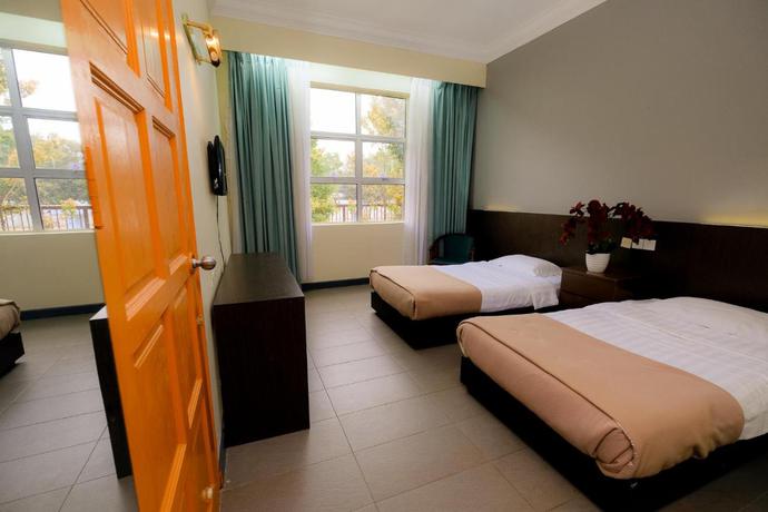 Imagen de la habitación del Hotel Super OYO Capital O 90146 Alh Continental Resort. Foto 4