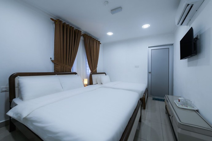 Imagen de la habitación del Hotel Super OYO Capital O 90543 Sp Star. Foto 16