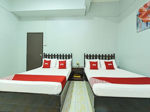 Imagen de la habitación del Hotel Super OYO Capital O 90659 Raintown Timbers. Foto 4