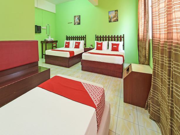 Imagen de la habitación del Hotel Super OYO Capital O 90659 Raintown Timbers. Foto 5