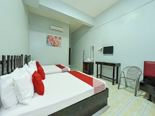 Imagen de la habitación del Hotel Super OYO Capital O 90659 Raintown Timbers. Foto 6