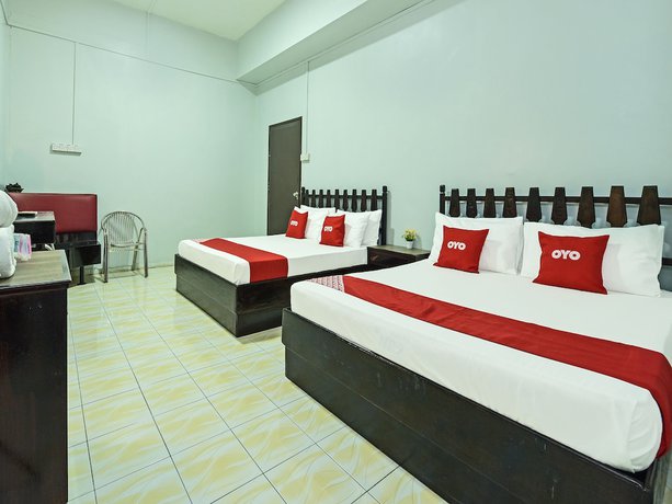 Imagen de la habitación del Hotel Super OYO Capital O 90659 Raintown Timbers. Foto 7
