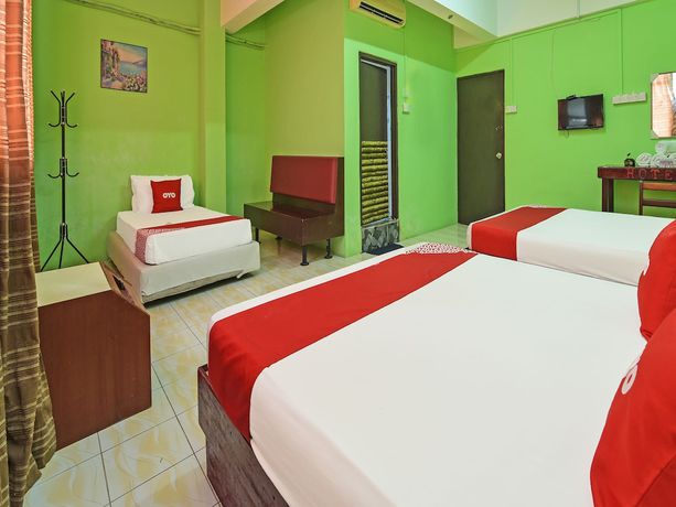 Imagen de la habitación del Hotel Super OYO Capital O 90659 Raintown Timbers. Foto 8