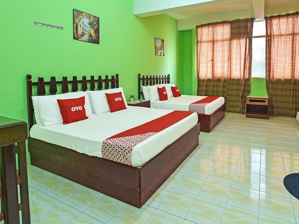 Imagen de la habitación del Hotel Super OYO Capital O 90659 Raintown Timbers. Foto 9