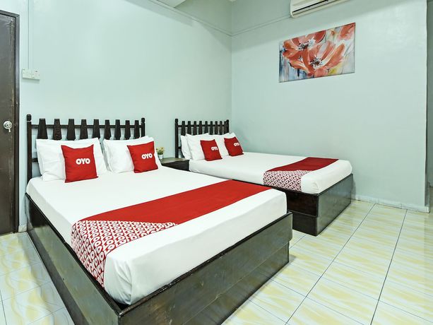 Imagen de la habitación del Hotel Super OYO Capital O 90659 Raintown Timbers. Foto 11