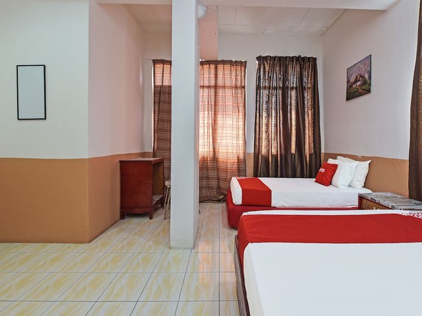 Imagen de la habitación del Hotel Super OYO Capital O 90659 Raintown Timbers. Foto 13