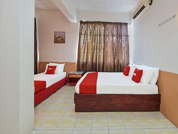Imagen de la habitación del Hotel Super OYO Capital O 90659 Raintown Timbers. Foto 14