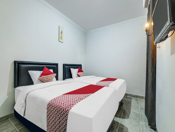 Imagen de la habitación del Hotel Super OYO Capital O 90983 Harmony Easy Stay. Foto 18