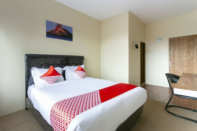 Imagen de la habitación del Hotel Super OYO Collection O 3130 D\'Valley View. Foto 17