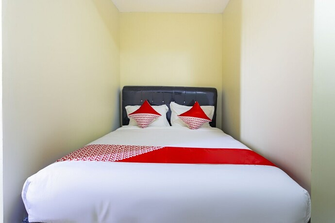 Imagen de la habitación del Hotel Super OYO Collection O 3130 D\'Valley View. Foto 19