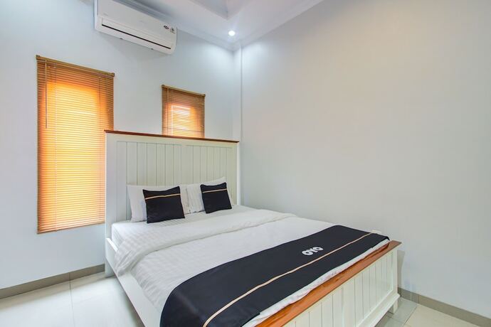 Imagen de la habitación del Hotel Super OYO Collection O 3280 Cendhani Raras. Foto 15